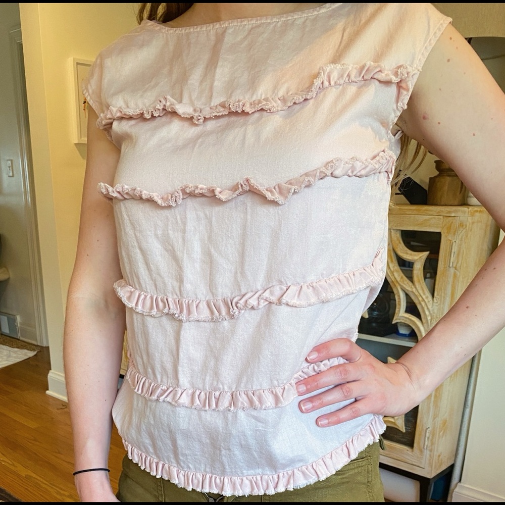 Soft pink ruffled blouse